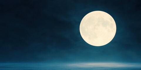 Obraz premium Bright full moon illuminating a dark, misty sky at night.
