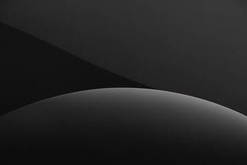A minimalistic monochromatic image with a dark, almost black, gradient background