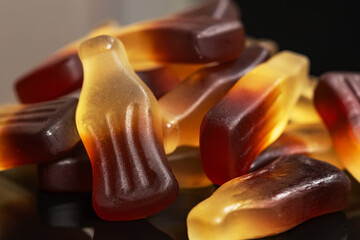 Close view of cola bottle gummi sweets candies