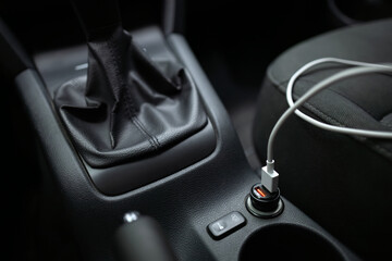 car charger for phone plugged into cigarette lighter