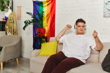 A person experiences joyful music while surrounded by vibrant decorations at home.