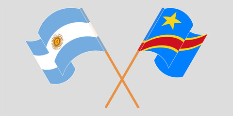 Crossed and waving flags of Argentina and Democratic Republic of the Congo. Vector illustration