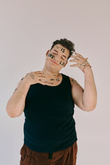 This captivating individual expresses their identity and creativity through body art.