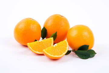oranges with leaves on a white background