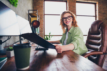 Photo of positive good mood lady specialist dressed shirt eyewear holding list texting modern...