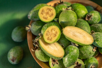 Feijoa green fruit bowl. Diet food. Guava harvest.