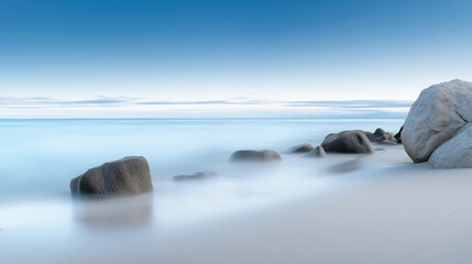 A peaceful beach with calm waves and white sand, photographed in a natural, relaxing style with soft tones