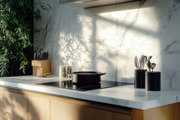 Sunlit modern kitchen featuring a marble backsplash, induction cooktop with a pan, and organized utensils, creating a minimalist, elegant cooking space.
