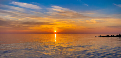  Summer sea design template. Beautiful sunset on tropical beach  and sunlight on horizon