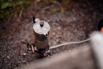 Moka Pot Brewing Coffee on Portable Camping Stove