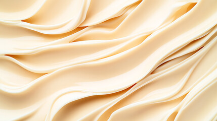 Obraz premium Abstract close-up of smooth, creamy beige textures resembling flowing fabric or waves, showcasing an artistic background pattern in soft hues