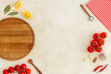 Cooking layout with wooden cutting board and vegetables. Menu concept