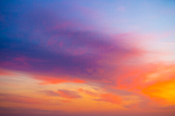  Beautiful sunset sky with amazing colorful clouds against deep blue