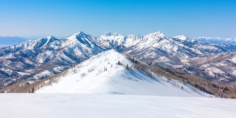 Breathtaking winter landscape snow-capped mountains under clear blue skies inspire adventure and serenity
