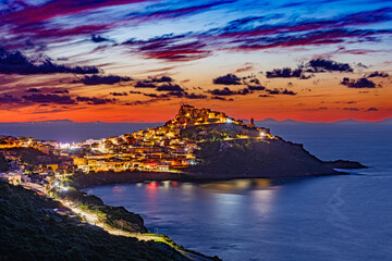 Dramatic sunset over the medieval town of Castelsardo, Province of Sassari, Sardinia, Italy, Europe.