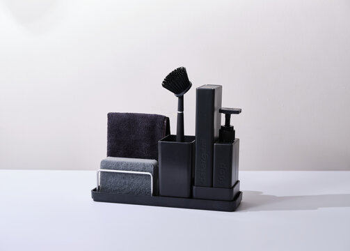 Black sink organiser on a white background