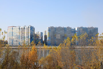 Fototapeta premium Autumn landscape with multi-storey buildings in the Siberian city of Novosibirsk