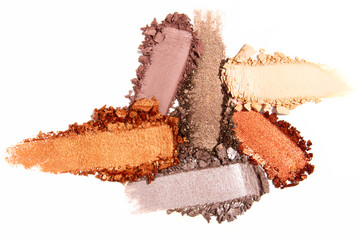 Composition of eyeshadow smears on a light white background. Cosmetic texture, vibrant and layered.