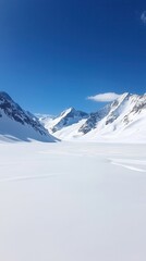 Breathtaking snow-covered mountains under a clear blue sky