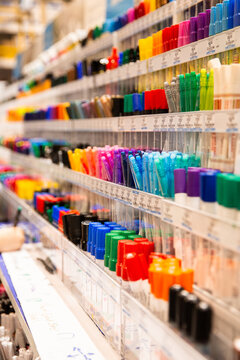 pens displayed for testing and sale at an office supply store