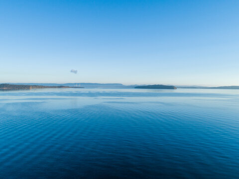 Aerial landscape view over blue water of lake Macquarie on calm morning