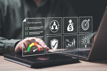 Risk Assessment, Review key risk topics concept, Businessman risk management and check on documents...