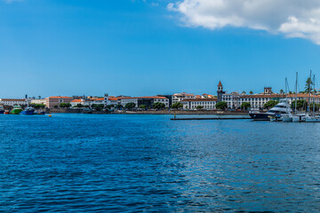 A view looking back from a boat leaving Ponta Delgada on the island of San Miguel in the Azores in summertime