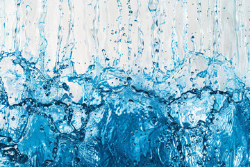 a close up of water pouring down a shower head