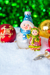 Christmas and New Year background. handmade Christmas glass toys in the snow, Christmas card. place for text.