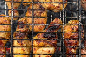 Chicken legs on the grill	