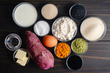 Ingredients for Colorful Swirled Bread with a Halloween Theme: Bread flour with yeast and natural food colorants like matcha, turmeric, charcoal, and purple sweet potato