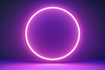 Obraz premium A vibrant pink neon light forms a perfect circle, casting a soft glow against a dark backdrop for dramatic effect.