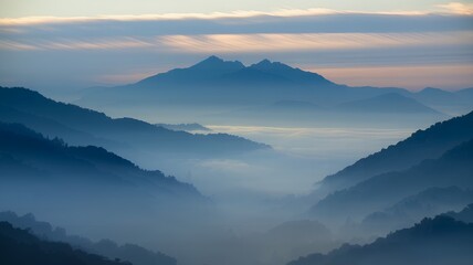 Fototapeta premium Morning Calm Misty Mountains, Lush Greenery, and a Soft Sunrise Glow
