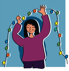 Woman decorating with a garland