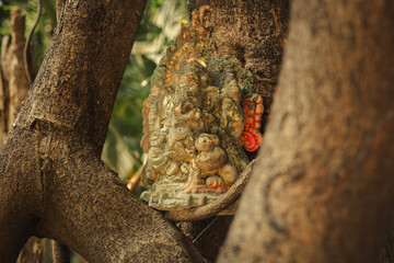 Figure of Lord Ganesha on the tree