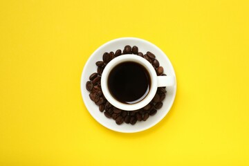 Cup of coffee on color background