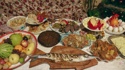 A table for Media Noche or New Year eve feast with diverse traditional Filipino auspicious dishes...