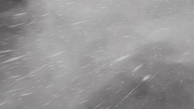 Three different types of impressive snow blizzards covering the entire screen, overlay of storms with rain and snow, black background