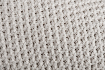 Macro photography of fabric texture, detailing soft waves and patterns, creating an impression of tactile comfort and artistic elegance
