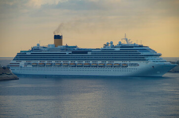 Modern Italian family cruiseship cruise ship liner Fascinosa morning arrival into port of Valletta,...