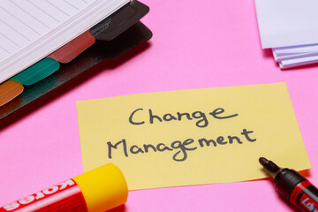 Change management symbol. Concept words Change management on beautiful yellow paper. Beautiful pink...