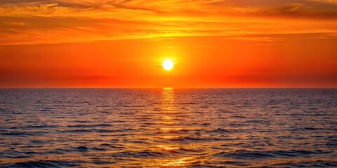 A close-up shot of an orange-colored sunset over a vast ocean, waves, landscape, sea, gradient