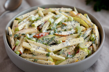 Homemade Fall Apple Slaw Salad in a Bowl, side view.