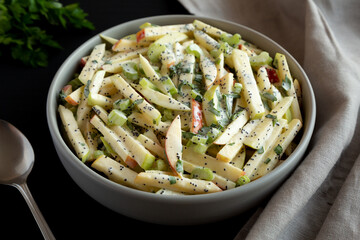 Homemade Fall Apple Slaw Salad in a Bowl, side view.