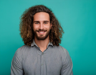 Obraz premium Happy Man Smiling Against Colorful Studio Background