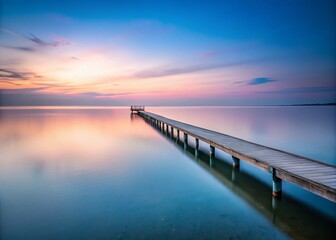 Fototapeta premium Serene Wooden Pier at Dusk - Minimalist Seascape with Tranquil Waters, Soft Hues, and Endless Horizon for Peaceful Coastal Retreat Imagery