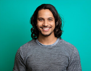 Obraz premium Happy Man Smiling Against Colorful Studio Background