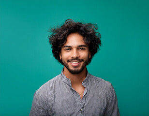 Obraz premium Happy Man Smiling Against Colorful Studio Background