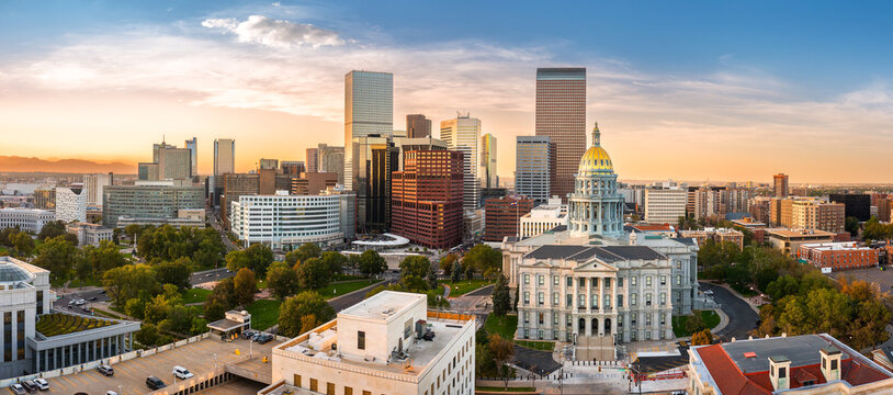 Aerial view of Denver, Colorado skyline and Colorado Capitol at sunset. Denver is a consolidated city and county, the capital, and most populous city of the U.S. state of Colorado