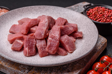 Juicy beef cut into slices with salt, spices and herbs